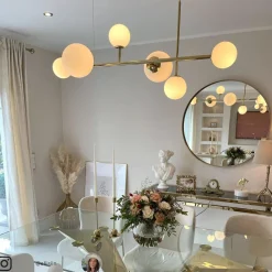 Affjedringslampe Dione, 6 lyskilder, gylden