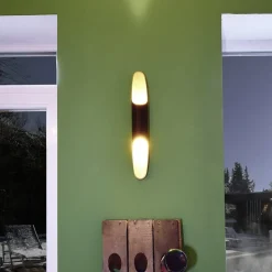 Apodis LED-væglampe, sort/guld, højde 50 cm, metal dæmpbar