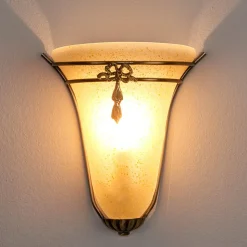 ASCANA væglampe, der virker antik