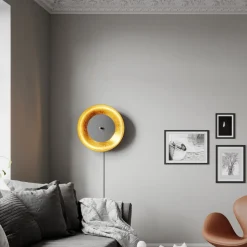 By Rydéns Shelby væglampe, stik sort/guld