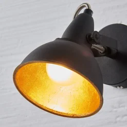 Julin sort og guldfarvet væglampe