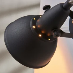 Julin sort og guldfarvet væglampe