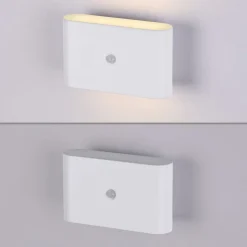 JUST LIGHT. LED-batteridrevet væglampe Ziddy, hvid, sensor 3.000 K