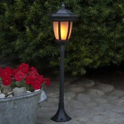 LED-solcellelampe Flame, 4-i-1, sort