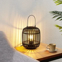 Lindby Canyana bordlampe, sort, rattan, 27 cm høj