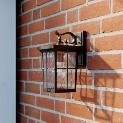 Lindby Charmaine udendørs væglampe, gyldenbrun