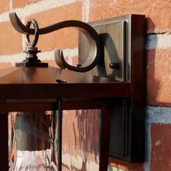 Lindby Charmaine udendørs væglampe, gyldenbrun