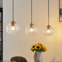 Lindby Grady hængelampe, messing/klar, 110 cm, metal, glas