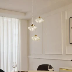 Lindby hængelampe Piatra, Ø25cm, 3 lyskilder, cognac/messing, glas