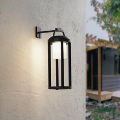 Lucande 2-i-1 LED-solcellelampe Tilena, sort, rund, aluminium