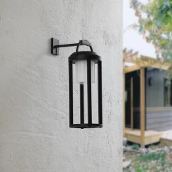 Lucande 2-i-1 LED-solcellelampe Tilena, sort, rund, aluminium