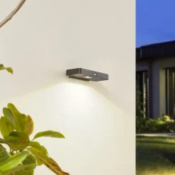 Lucande LED-solcelle-væglampe Tavon, kantet, sort, sensor