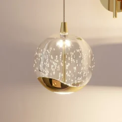 Lucande LED-væglampe Hayley, guldfarvet, glas, 34 cm høj