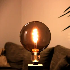 Müller Licht tint white LED-globe E27 4,9 W guld