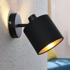 Vasilia væglampe i sort og guld, 1 lyskilde.