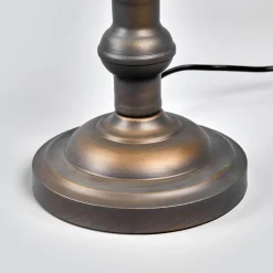Verda iøjnefaldende banklampe med fod i antikbrun