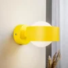 Væglampe Mado i stål, gul, 1 lyskilde
