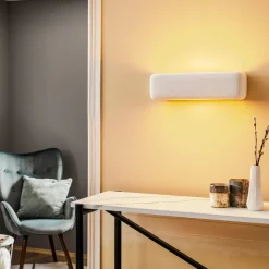 Væglampe Noris op/ned i hvid keramik